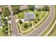 Aerial view showcases home's manicured lawn, mature trees, and circular driveway at 2801 Palmyra Ct, St Cloud, FL 34772