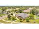 Expansive aerial view of a single-Gathering home showcasing its lush landscaping at 2801 Palmyra Ct, St Cloud, FL 34772