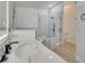 Elegant bathroom featuring dual sinks, soaking tub and glass shower at 2801 Palmyra Ct, St Cloud, FL 34772