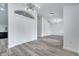 Spacious living area featuring modern lighting fixtures and seamless flow at 2801 Palmyra Ct, St Cloud, FL 34772