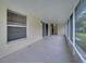 Spacious screened-in patio with tiled floor, window, sliding doors and entrance at 2801 Palmyra Ct, St Cloud, FL 34772