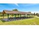 Outdoor covered picnic area featuring rows of tables and ample seating space at 2801 Palmyra Ct, St Cloud, FL 34772