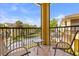 Relaxing balcony with outdoor seating overlooking the neighborhood at 2835 Oakwater Dr # 2835, Kissimmee, FL 34747
