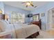Relaxing bedroom with a window, and comfortable furniture at 2835 Oakwater Dr # 2835, Kissimmee, FL 34747
