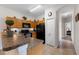 Well-lit kitchen with stainless steel appliances, cabinets, and countertops, perfect for cooking and entertaining at 2835 Oakwater Dr # 2835, Kissimmee, FL 34747