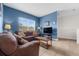 Comfortable living room with large window, cozy furniture and tile flooring at 2835 Oakwater Dr # 2835, Kissimmee, FL 34747