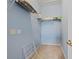 Spacious walk-in closet with carpet floor and a built-in shelving system at 2835 Oakwater Dr # 2835, Kissimmee, FL 34747