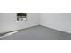 Carpeted bedroom with view of construction through single window at 2943 Gavin Sky Dr, Kissimmee, FL 34744