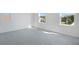 Inviting bedroom with a window offering natural light and plush neutral carpet at 2943 Gavin Sky Dr, Kissimmee, FL 34744