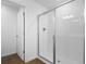 Bathroom featuring a glassed-in shower with white tile surround at 2967 Gavin Sky Dr, Kissimmee, FL 34744