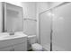 Modern bathroom with a glass-enclosed shower, sleek vanity, and ample lighting, perfect for a refreshing experience at 2967 Gavin Sky Dr, Kissimmee, FL 34744