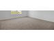 Spacious carpeted bedroom with window at 2967 Gavin Sky Dr, Kissimmee, FL 34744