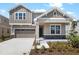Beautiful two-story home with a well-manicured lawn and attached two car garage, perfect for suburban living at 2967 Gavin Sky Dr, Kissimmee, FL 34744