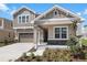 Beautiful two-story home with a well-manicured lawn and attached two car garage, perfect for suburban living at 2967 Gavin Sky Dr, Kissimmee, FL 34744