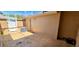 Private patio featuring decorative concrete and access to exterior storage and home entry at 300 Falling Water Dr, Kissimmee, FL 34759