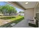 View of the backyard featuring a trampoline on the grass and an under the patio furniture set at 323 Azincourt Ln, Kissimmee, FL 34759