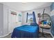 Bedroom with closet, window, and unique hanging chair at 323 Azincourt Ln, Kissimmee, FL 34759