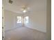 Bright bedroom with a ceiling fan and two windows providing natural light at 3245 Heirloom Rose Pl, Oviedo, FL 32766