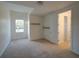 Bedroom features neutral carpet, with a closet and shelving inside at 3245 Heirloom Rose Pl, Oviedo, FL 32766