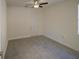 Simple bedroom featuring tile floors, a ceiling fan, and a closet at 3245 Heirloom Rose Pl, Oviedo, FL 32766