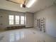 Spacious garage with built-in storage and natural light from multiple windows at 3245 Heirloom Rose Pl, Oviedo, FL 32766