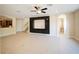 Bright, open living room showcasing tiled floors, a ceiling fan, and a built-in entertainment center at 3245 Heirloom Rose Pl, Oviedo, FL 32766
