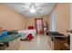 Spacious bedroom with storage, tile floor, single bed, and window at 333 Lake Howard Dr Nw # 204D, Winter Haven, FL 33880