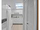 Bright kitchen featuring white cabinets, modern appliances, and a unique skylight at 333 Lake Howard Dr Nw # 204D, Winter Haven, FL 33880