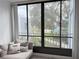 Cozy lanai with comfortable seating, offering views of the well-maintained community and lush greenery at 3592 Southpointe Dr # 2, Orlando, FL 32822