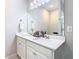 Bathroom featuring a double sink vanity with white quartz countertops at 372 Meadow Pointe Dr, Haines City, FL 33844