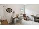 Bedroom featuring desk with workspace and sitting area with rocking chair at 3775 Via Mazzini Ct, Kissimmee, FL 34759