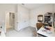 Bedroom featuring closet with doors, a desk, and carpeted floor at 3775 Via Mazzini Ct, Kissimmee, FL 34759