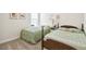 Bedroom showing two twin beds and carpeted floor at 3775 Via Mazzini Ct, Kissimmee, FL 34759