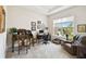 Office featuring high ceilings, a large window, and antique-style furniture at 3775 Via Mazzini Ct, Kissimmee, FL 34759