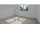Bright bedroom with neutral carpet and natural light through window at 4075 Bannock Ave, Tavares, FL 32778