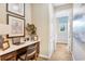 Well-lit office space with a built-in desk, chair, and neutral walls at 4075 Bannock Ave, Tavares, FL 32778
