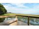 Picturesque waterfront view from a wooden deck, offering serene scenery and a peaceful retreat by the water at 4083 Bannock Ave, Tavares, FL 32778