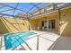 Private pool and patio with ample seating for outdoor dining and relaxation in a screened-in enclosure at 4751 Terrasonesta Dr, Davenport, FL 33837