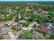 Stunning aerial view of the neighborhood showcasing lush greenery and well-maintained homes at 6017 Hickory Grove Ln, Port Orange, FL 32128