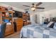 Comfortable bedroom with ample closet space, a ceiling fan, and a relaxing ambiance at 6017 Hickory Grove Ln, Port Orange, FL 32128