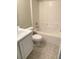 Functional bathroom featuring a tub/shower combination and a single sink vanity at 610 Yak Ct, Kissimmee, FL 34759