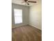 Cozy bedroom with carpet flooring and window providing natural light at 610 Yak Ct, Kissimmee, FL 34759