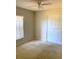 Bright bedroom with carpet, closet and window at 610 Yak Ct, Kissimmee, FL 34759
