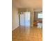 The dining area with sliding glass door provides views of the backyard at 610 Yak Ct, Kissimmee, FL 34759
