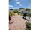 Well-maintained backyard with brick paver walkway and privacy fence at 6608 Harper Way, Harmony, FL 34773