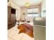 Cozy bedroom featuring a stylish desk and decorative cowhide rug at 6608 Harper Way, Harmony, FL 34773