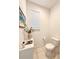 Half bathroom with stylish decor and natural light at 6608 Harper Way, Harmony, FL 34773