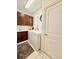 Well-organized laundry room featuring a washer and dryer, sink, and ample cabinet space for storage at 6608 Harper Way, Harmony, FL 34773