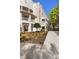 Beautiful building exterior with manicured lawn, shrubs, and a sidewalk at 675 Celebration Ave, Celebration, FL 34747