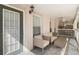 Charming front porch with comfortable seating, offering a relaxing outdoor space to enjoy at 675 Celebration Ave, Celebration, FL 34747